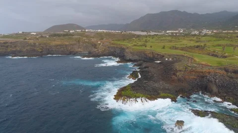 Aerial view of cliffs and Atlantic ocean on Tenerife, drone shot from above Stock Footage 97712081