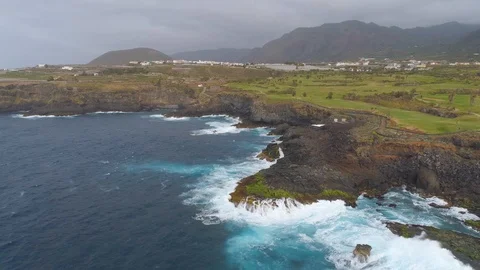 Aerial view of cliffs and Atlantic ocean on Tenerife, drone shot from above Stock Footage 97712218