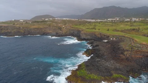 Aerial view of cliffs and Atlantic ocean on Tenerife, drone shot from above Stock Footage 97712440