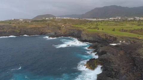 Aerial view of cliffs and Atlantic ocean on Tenerife, drone shot from above Stock Footage 97712547