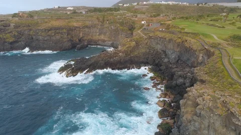 Aerial view of cliffs and Atlantic ocean on Tenerife, drone shot from above Stock Footage 97713433