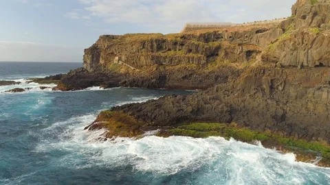 Aerial view of cliffs and Atlantic ocean on Tenerife, drone shot from above Stock Footage 97714059