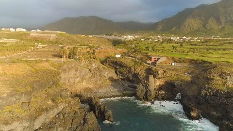 Aerial view of cliffs and Atlantic ocean on Tenerife, drone shot from above Stock Footage 97714283