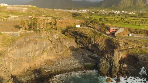 Aerial view of cliffs and Atlantic ocean on Tenerife, drone shot from above Stock Footage 97714347
