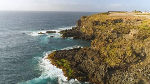 Aerial view of cliffs and Atlantic ocean on Tenerife, drone shot from above Stock Footage 97714672