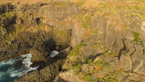 Aerial view of cliffs and Atlantic ocean on Tenerife, drone shot from above Stock Footage 97715349