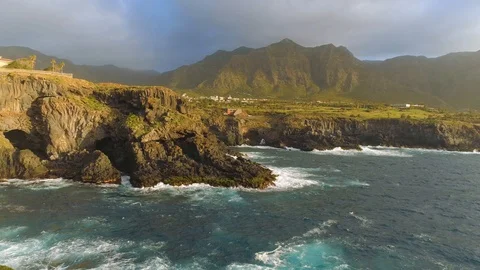 Aerial view of cliffs and Atlantic ocean on Tenerife, drone shot from above Stock Footage 97716644
