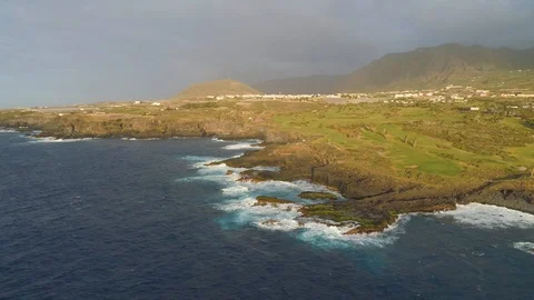 Aerial view of cliffs and Atlantic ocean on Tenerife, drone shot from above Stock Footage 97718272