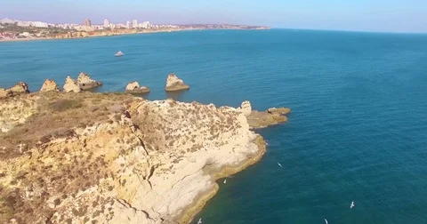 Aerial view of cliffs and beach Praia in Portimao, Algarve region, Portugal Stock Footage
