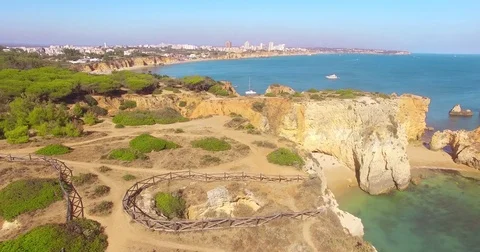 Aerial view of cliffs and beach Praia in Portimao, Algarve region, Portugal Stock Footage
