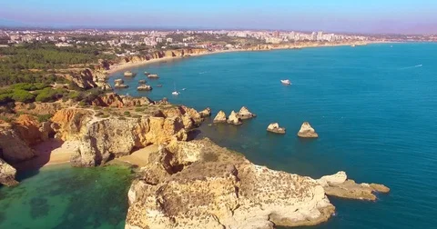 Aerial view of cliffs and beach Praia in Portimao, Algarve region, Portugal Stock Footage 77456194