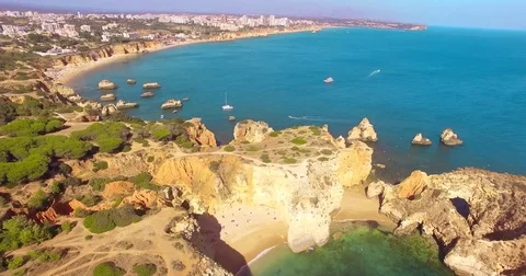 Aerial view of cliffs and beach Praia in Portimao, Algarve region, Portugal Stock Footage 77456365