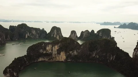 Aerial view of cliffs and boats Ha Long Bay,Ha Long, Vietnam Stock Footage 92365271