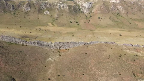 Aerial view of cliffs and mountains 4 Stock Footage 294102963