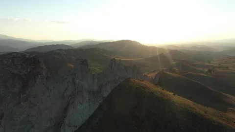 Aerial view of cliffs and mountains at sunset Video stock 294103296