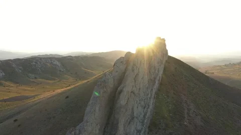 Aerial view of cliffs and mountains at sunset 3 Stock Footage 294103404