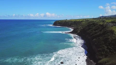 Aerial view of cliffs and ocean in St Kitts Stock Footage 83637277