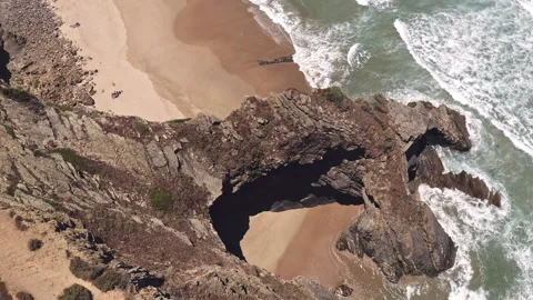 Aerial view of cliffs and sandy beach in Portugal. Rocky beach in Algarve. Stock Footage 150841654