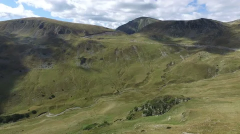 Aerial view of the cliffs and valleys of Transalpina Stock Footage 57798850