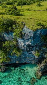 Aerial view of cliffs on the edge of the ocean Stock Photos