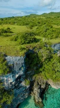 Aerial view of cliffs on the edge of the ocean Stock Photos