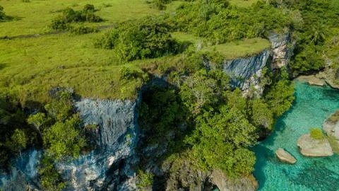 Aerial view of cliffs on the edge of the ocean Stock Photos