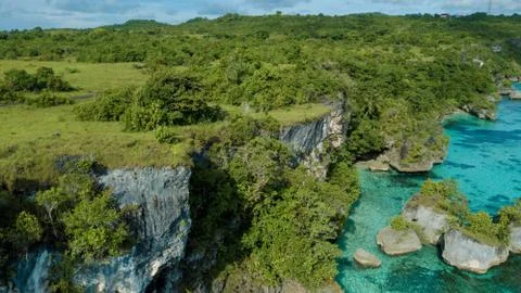 Aerial view of cliffs on the edge of the ocean Stock Photos