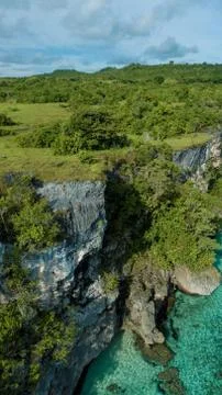 Aerial view of cliffs on the edge of the ocean Stock Photos