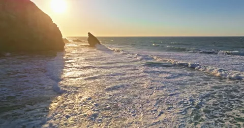Aerial view of the cliffs of the famous Cabo da Roca are washed by the huge Video stock 308962756