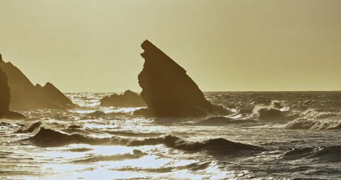 Aerial view of the cliffs of the famous Cabo da Roca are washed by the huge Stock Footage 308963114