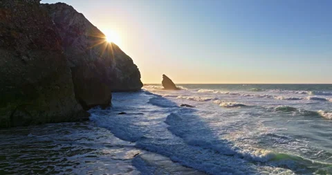 Aerial view of the cliffs of the famous Cabo da Roca are washed by the huge 库存影片 316045876