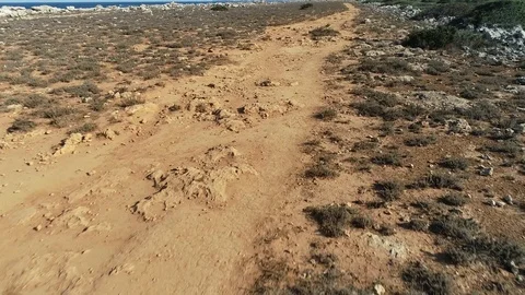 Aerial view of cliffs on the island of Menorca Stock Footage 120945175