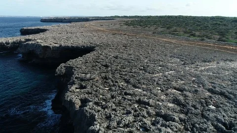 Aerial view of cliffs on the island of Menorca Stock Footage 120945214