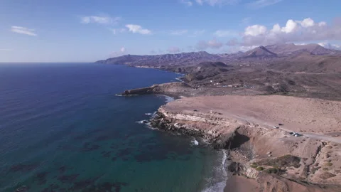 Aerial view of cliffs overlooking the sea, La Pared, Fuerteventura Stock Footage 310408252