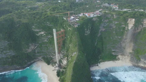 Aerial View Of Cliffside Construction And Glass Elevator In Bali Stock Footage 336488760
