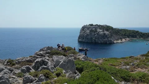 Aerial view Cliffside overlooking Blue Sea Faliraki, Greece; 15 August 2023 動画素材 269781692