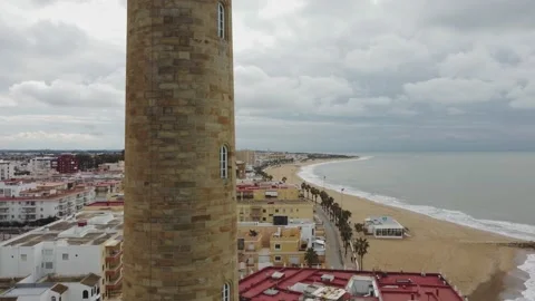 Aerial view climbing the Chipiona lighthouse with a drone in 4K. Stock Footage 150705378