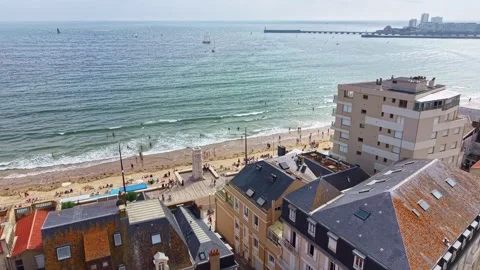 Aerial view of clock tower and beach in Les Sables-d'Olonne, France Stock Footage 337794930