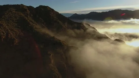 Aerial View Close Flying Over Mountains Covered By Fog Over  Coachella Valley Stock Footage 146817876