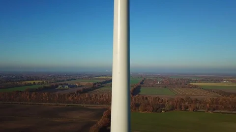 Aerial view close up view of wind energy turbine Stock Footage 124810376