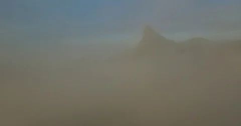 Aerial view of cloud around Christ the Redeemer. Rio De Janeiro, Brazil. Shot in Video stock 77739526