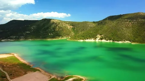 Aerial view of cloud shadows on lake in Cyprus. Video stock 191359662