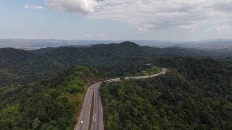 Aerial View of Cloud Shadows Moving Over Lush Mountain Range Stock Footage 327507714