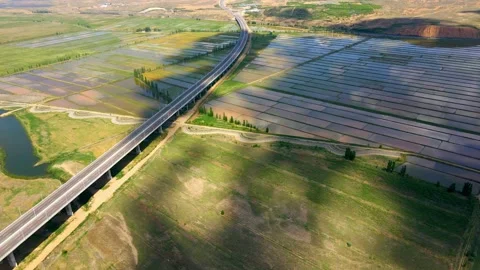 Aerial view of cloud shadows passing over rice fields Stock Footage 293335751