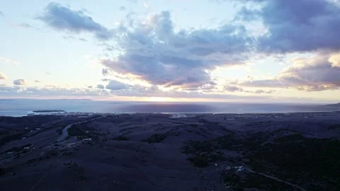 Aerial view on a cloud sunset over the ocean in Tarifa Stock Footage 231346116