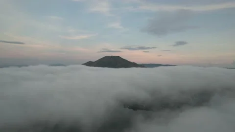 Aerial View: Clouds above Vulcano Batur and Lake Batur Stockbeeldmateriaal 236679925