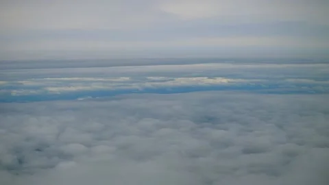 Aerial view of clouds from an airplane window Stock Footage 160558432