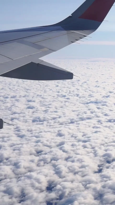 Aerial View of Clouds From Airplane Window Stock Footage 346639364