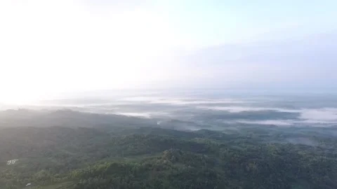 Aerial view of the clouds and fogs over the mountains (11) Video stock 145745462