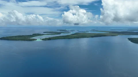 Aerial View of Clouds and Low Islands in Solomon Islands Stock Footage 228657987